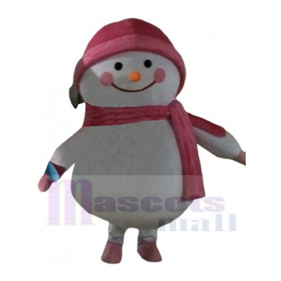 Schneemann Maskottchen Kostüm Karikatur mit rosa Mütze und Schal